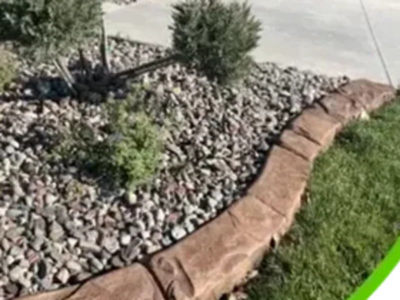 Stamped border beside a gravel landscape bed